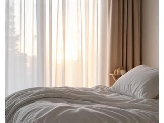 Peaceful bedroom with soft light, representing sleep optimization.